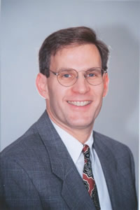Dr. Jeffrey Miron smiling