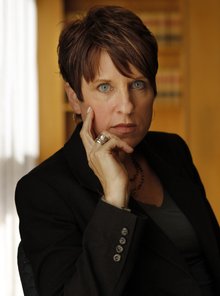 US Attorney Laura Duffy strikes a serious pose